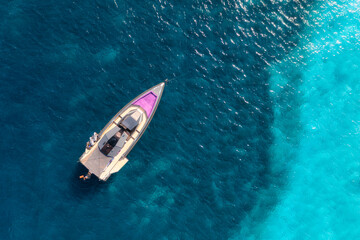 Wall Mural - aerial view of beautiful luxury yacht and boat in blue sea in summer. sardinia, italy. top drone vie