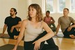 © Rawpixel.com - Diverse group practicing yoga.
