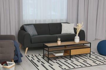 Poster - stylish room interior with comfortable sofa and beautiful window curtains