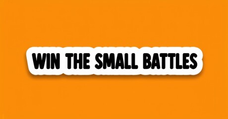Fototapete - Orange background features white rounded rectangle. Bold black text reads WIN THE SMALL BATTLES. Simple motivational message, clean design, positive vibes.