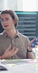 Poster - Explain, phone screen and pitch with business man in office for meeting or presentation. App development, ideas and planning with employee team in boardroom for brainstorming, review or strategy