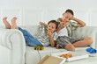 © aletia2011 - Kids Eating Pizza on the Couch