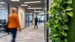 © RAT-GSJ - Close Up of Green Wall Featuring Lush Plant in Modern Office Space