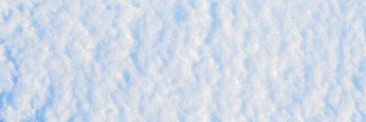 Wall Mural - natural snow texture. the surface of the snow crust. snowy ground. winter background with snow patte