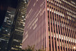 © BullRun - Row of business buildings in evening time