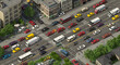 © Tahira - Aerial view of a busy city intersection with various vehicles and pedestrian crosswalks on a sunny day