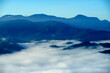 © sakhorn38 - Serene Mountain Landscape Above Misty Clouds at Dawn in Nature