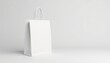 © Sayfar - Close-up view of a single white cotton shopping bag on a white backdrop , fabric bag, photography, blank