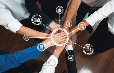 Aufkleber - Group of diverse office worker join hand together in office room symbolize business synergy and strong productive teamwork in workplace. Cooperation and unity between business employee. Prudent Amity