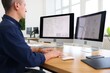 © New Africa - Engineer working with digital drawings at table in office