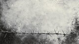 Barbed wire fence on grunge wall background