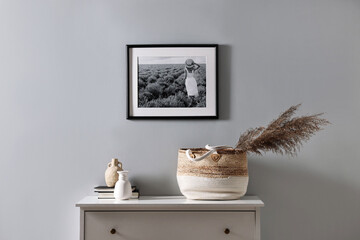 Aufkleber - Console table with decor and books light grey wall. Interior design