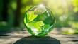 © Art - Crystal sphere showcasing vibrant green leaves
