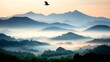 © RETNO - Serene mountain landscape with fog and a flying bird at dawn