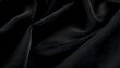 © Appril Studio  - Close-up of Draped Black Fabric with Soft Texture