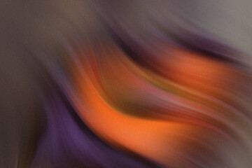 Wall Mural - a blurry close up of an orange object with a purple background and a neutral colored wall visible be