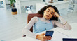 © DavidL2000/peopleimages.com - Bored woman, fatigue or phone on office with burnout for stress, insomnia or poor time management. Tired, female person or lazy employee on mobile smartphone in procrastination or sluggish work ethic