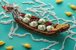 © lia - There are several buns on a dragon boat