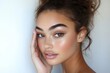 © Антон Сальников - The attractive young woman with a radiant complexion looks away, showcasing the significance of cosmetology, beauty, and spa treatments for maintaining healthy and fresh skin