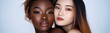© Антон Сальников - African American and Asian women are viewed from above, looking at the camera as they lie isolated on a white background, resembling a banner