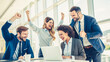 © iDoPixBox - A group of people are celebrating a victory in a business meeting