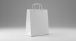 © rdkcho - Blank White Paper Shopping Bag Mockup on Light Gray Background for Branding and Retail Design