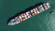 © Kokhanchikov - Top view of large cargo ship filled with colorful containers