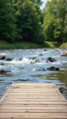 Wall Mural - Empty wooden jetty over flowing water in front of green blurred background