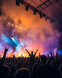 © leon - Live music concert crowd cheering at music festival with stage lights