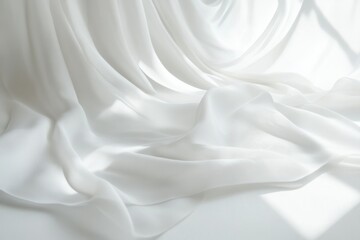 Leinwandbilder - White fabric drapes elegantly with soft light, creating a serene and pure texture. The folds enhance the minimalist composition.