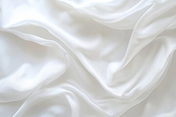 Leinwandbilder - Delicate folds of a pristine white textile cascade, creating a serene and elegant backdrop. Light and shadow enhance the texture.