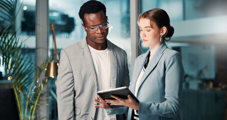 Fototapete - Business people, tablet and team brainstorming at night for deadline, progress update or project management. Meeting, planning and discussion with tech in office for budget, schedule and development