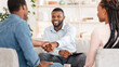 © Prostock-studio - Marriage Counseling. Thankful Black Couple And Marital Therapist Shaking Hands After Successful Meeting In Office, Selective Focus