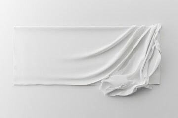 Poster - Minimalist presentation with soft, draped white fabric partially covering a rectangular surface, creating a sense of elegance and mystery.