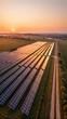 © 004 - Rows of solar panels catching orange twilight light, wide scenic perspective.