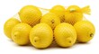 © Muaz - A group of bright yellow lemons are contained within a yellow mesh bag on a white background surface