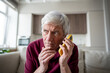 © DimaBerlin - Tired distrust shocked retiree man in discomfort listening to unknown caller making dubious requests. Phone scam warning call, social engineering, elder fraud, telemarketing, call manipulation