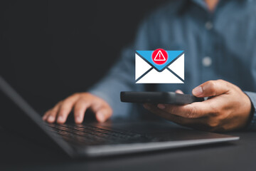 Fototapete - Man with email hacked warning alert notification, junk mail, scam malware spreading virus on message alert virtual on smartphone. Potential cybersecurity threats and warnings.