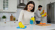 © StockWorld - Happy Couple Cleaning Kitchen Together: Home Care, Housework, and Healthy Living. Sparkling Results Guaranteed!
