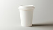 © Taras Vykhopen - Realistic white enamel coffee cup mockup displayed on a clean grey background for design purposes