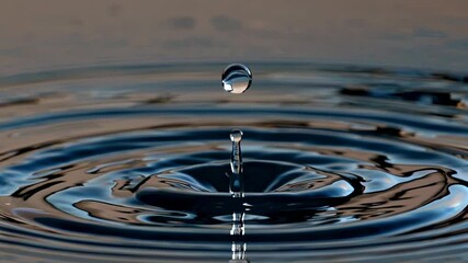 Fototapete - rippling water creates mesmerizing patterns as a droplet falls into a tranquil surface at sunset