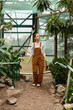 © LIGHTFIELD STUDIOS - Exploring the lush beauty of a greenhouse while cherishing natures vibrant wonders