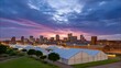 © Biggy - City skyline at sunrise, numerous white tents below