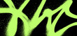 © annetdebar - Vivid neon green graffiti spray overlay with grunge texture on a dark background