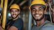 © marimalina - Two young electrician students smile while doing work practices, vocational training concept
