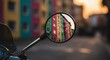 © komori - A rearview mirror reflects a colorful building in an urban environment