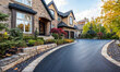 © Mattie - Freshly paved driveway enhances the curb appeal of a beautiful home in a serene neighborhood