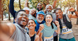© Jessy/peopleimages.com - Running, selfie and portrait of friends in park for social media, memory and online post for success. Runner group, celebrate and men and women with photo POV to finish exercise, workout and marathon
