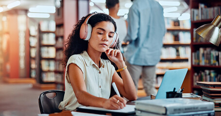 Aufkleber - Student, headphones and writing in library for university, woman and studying for education or project. Female person, notes and academy campus with literature, research and assignment for knowledge