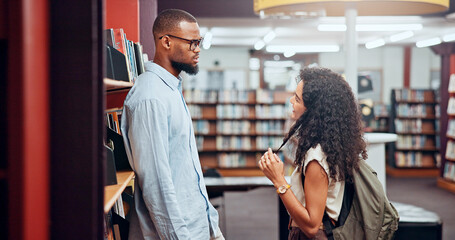 Aufkleber - Couple, flirting or man with woman in library for dating, college education and chat on break. University, interracial and students talking in campus for learning, relationship and studying together
